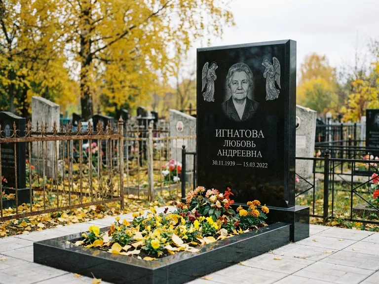 Памятник с гравировкой ангела — гравировка двух ангелов по сторонам портрета, работа «Игнатова» в Туле